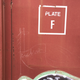 Wee creature of interperable (?) label on train.